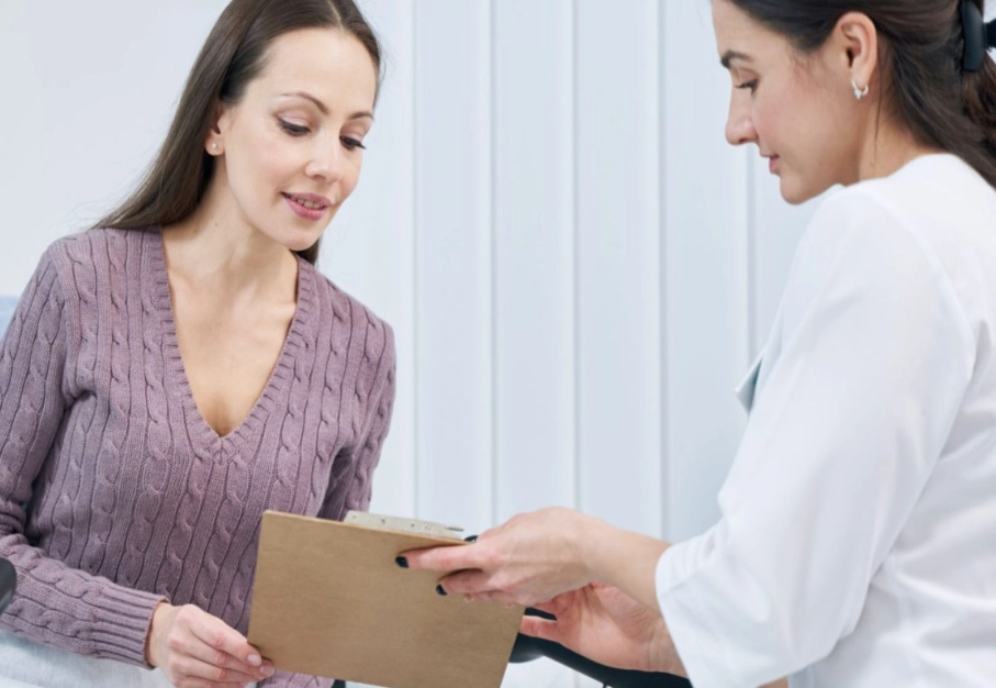 What does a women's wellness exam consist of?