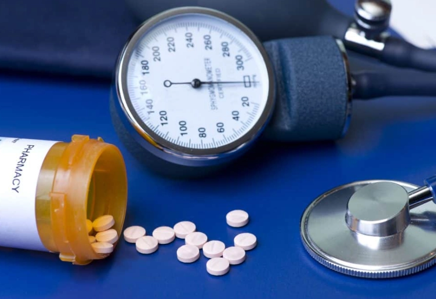 what helps bring high blood pressure down